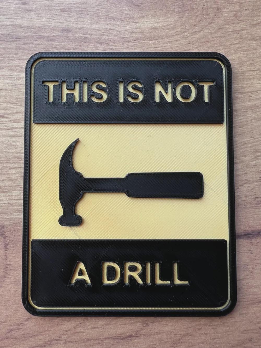 This is not a drill - Sign with Hammer β funny 3D printed wall decor β tool joke gift, garage sign, workshop humor, man cave decor